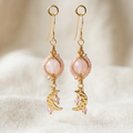AI-generated sample handmade pink bead drop earrings